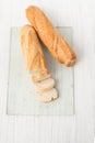 Two French baguette on a white table Royalty Free Stock Photo