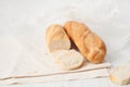 Two French baguette on a white table Royalty Free Stock Photo