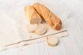 Two French baguette on a white table Royalty Free Stock Photo