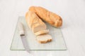 Two French baguette on a white table Royalty Free Stock Photo