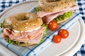 Two fresh bagels with honey roasted ham