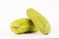 Two fresh bitter melons arranged on white background with soft lighting Royalty Free Stock Photo