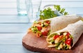Two fresh chicken and salad tortilla wraps Royalty Free Stock Photo