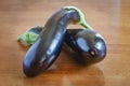 Two fresh eggplants on the table Royalty Free Stock Photo