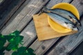 two fresh fish on a cutting Board, cooking mackerel,fish tails close up Royalty Free Stock Photo
