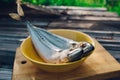 two fresh fish on a cutting Board, cooking mackerel,fish tails close up Royalty Free Stock Photo