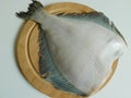 two fresh flounders, large and small, before cooking Royalty Free Stock Photo