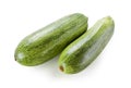 Two fresh green zucchini isolated on white Royalty Free Stock Photo