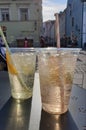 Two fresh lemonade glasses against the backdrop of old town Tallinn, Estonia