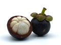 Two fresh mangosteen With one child that was cut in half to see ingrown texture antioxidants, help to slow down aging. Royalty Free Stock Photo