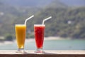 Two fresh organic shake from mango and watermelon in thai restaurant on the beach near sea in Thailand. Close up Royalty Free Stock Photo