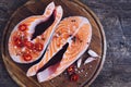 Two fresh raw salmon steaks with spices Royalty Free Stock Photo