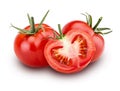 Two fresh red tomato and one cut in half with green leaves Royalty Free Stock Photo