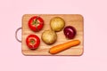 Two Fresh Tomatoes Near Potatoes, Violet Onion And Carrot Royalty Free Stock Photo