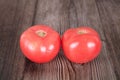 Two fresh tomatoes on table Royalty Free Stock Photo