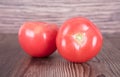 Two fresh tomatoes on table Royalty Free Stock Photo