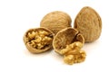 Two fresh walnuts and a cracked one Royalty Free Stock Photo