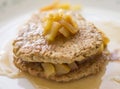 Two freshly baked oatmeal pancakes with apple Royalty Free Stock Photo