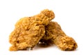 Two fried chicken legs close up on a white. . Royalty Free Stock Photo