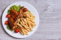 Two fried chicken wings, french fries. top view Royalty Free Stock Photo