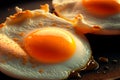 Two Fried eggs in a frying pan. Egg cooking process. Royalty Free Stock Photo