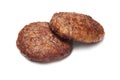 Two fried hamburger patties isolated on white Royalty Free Stock Photo