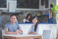 Two friend sitting in a coffee shop Royalty Free Stock Photo
