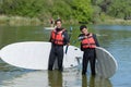 Two friends doing stand-up paddle