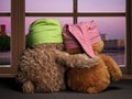 Two friends or fans to watch the sunset in the window. Toys colorful hats bear cubs. Embrace the . Concept - love, friendship,