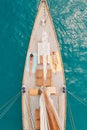 Two friends on holiday cruise together lying on boat sunbathing in bikinis from above. Two women relaxing on boat Royalty Free Stock Photo