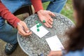 The Couple playing Yahtzee game in free time, outdor Royalty Free Stock Photo