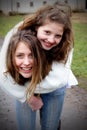 Two Friends Piggyback Royalty Free Stock Photo