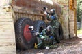 Two friends play paintball