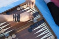 Two friends playing backgammon at home Royalty Free Stock Photo