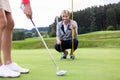 Two friends playing golf Royalty Free Stock Photo