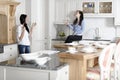 Two friends relaxing in the kitchen Royalty Free Stock Photo