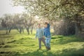 Two friends in the summer in the Park have fun and frolic outdoors Royalty Free Stock Photo