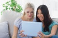 Two friends taking photo with tablet pc Royalty Free Stock Photo