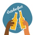 Two friends toast with bottles of light beer. People celebrating Oktoberfest festival. Have a beer with your friends