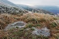 Two frozen puddle at mountains. First snow on landscapes Royalty Free Stock Photo