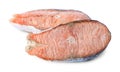 Two frozen salmon steaks isolated on white Royalty Free Stock Photo