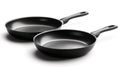 Two frying pans with non-stick coating Royalty Free Stock Photo