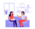 Two fun women friends talk at home on couch. Happy girls with cat are meeting and conversation. People spending time Royalty Free Stock Photo