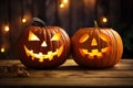 Two funny angry Halloween pumpkin head jack lantern candles burning fire Royalty Free Stock Photo