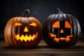 Two funny angry Halloween pumpkin head jack lantern candles burning fire Royalty Free Stock Photo