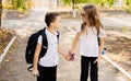 Two funny happy students kids on 1 September day. Education and back to school concept. Children pupils ready to learn Royalty Free Stock Photo