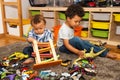 Two funny and messy baby brothers playing together Royalty Free Stock Photo