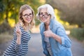 Two funny pretty women expressing their emotions. Royalty Free Stock Photo