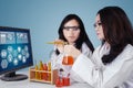 Two future scientists doing experiment Royalty Free Stock Photo