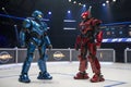 Two futuristic robots before match in blue and red color